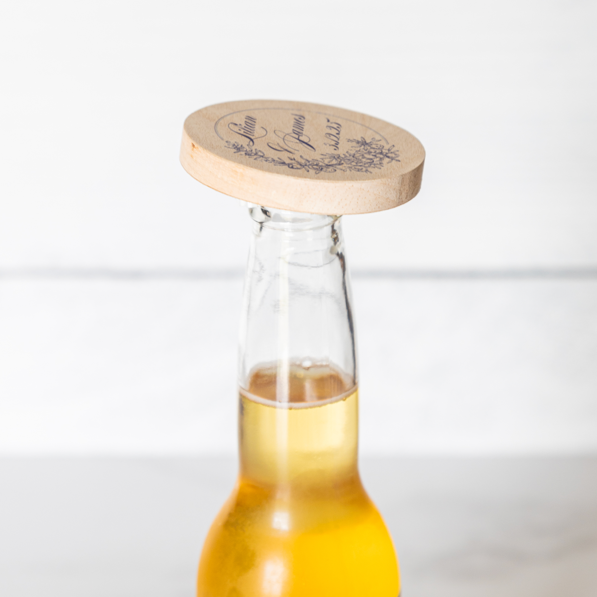 Wedding_Favor_Wooden_Bottle_Opener_-_Ful_Bottle_Use_Mockup.png